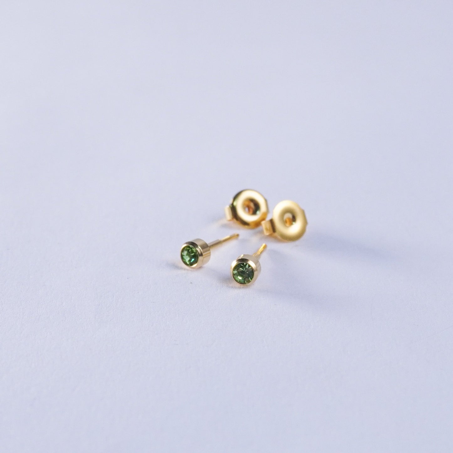 August – Peridot Bezel Set