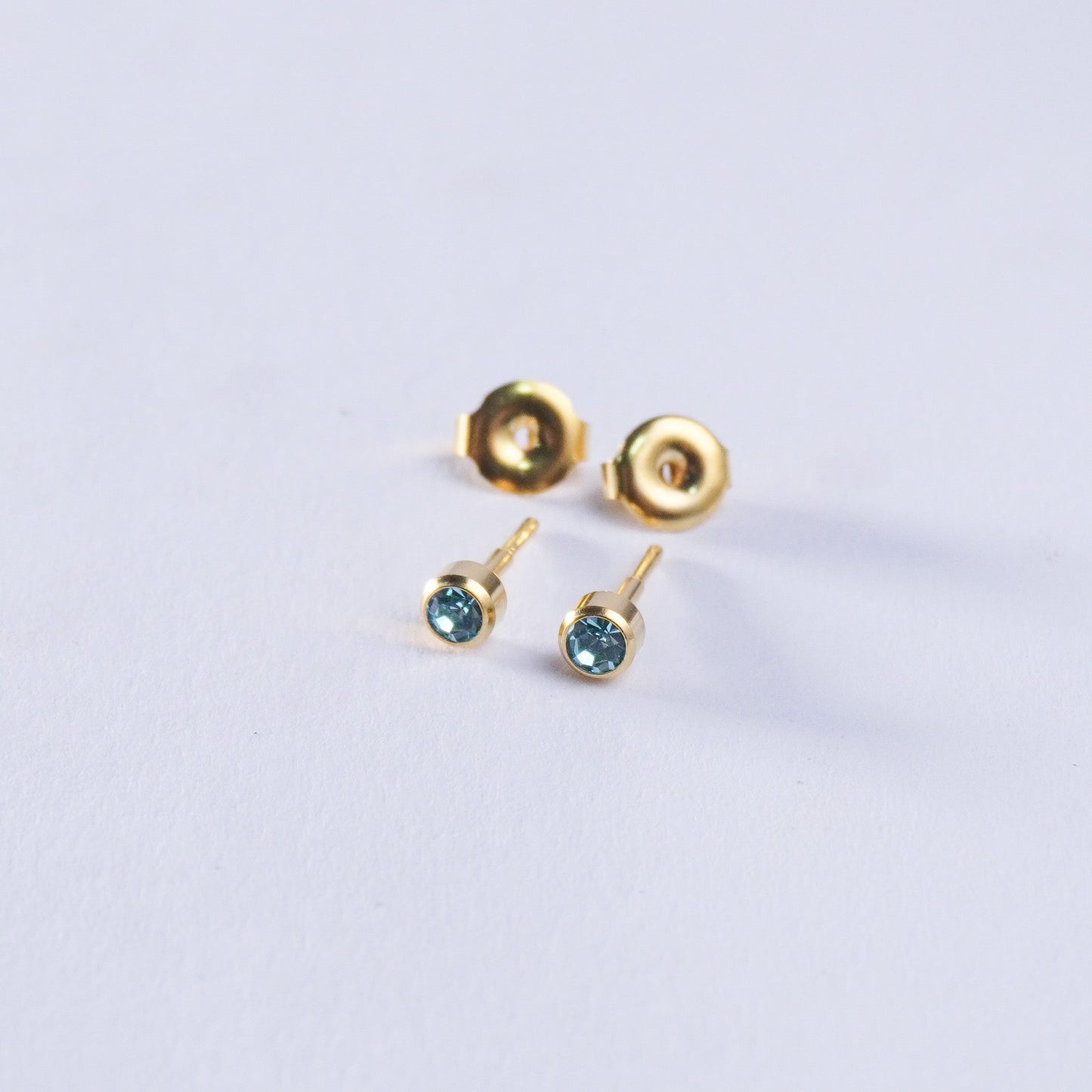 December – Blue Zircon Bezel Set