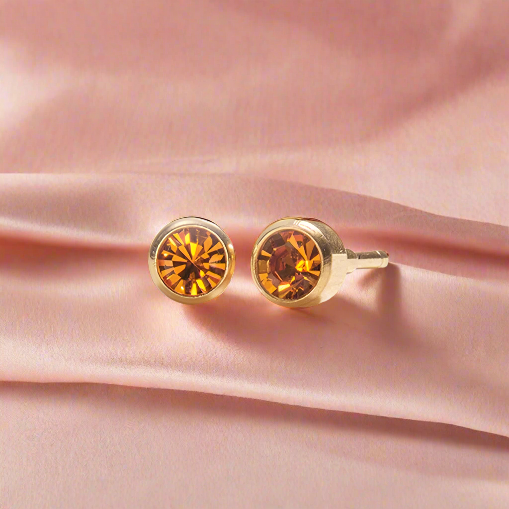 November – Topaz Bezel Set
