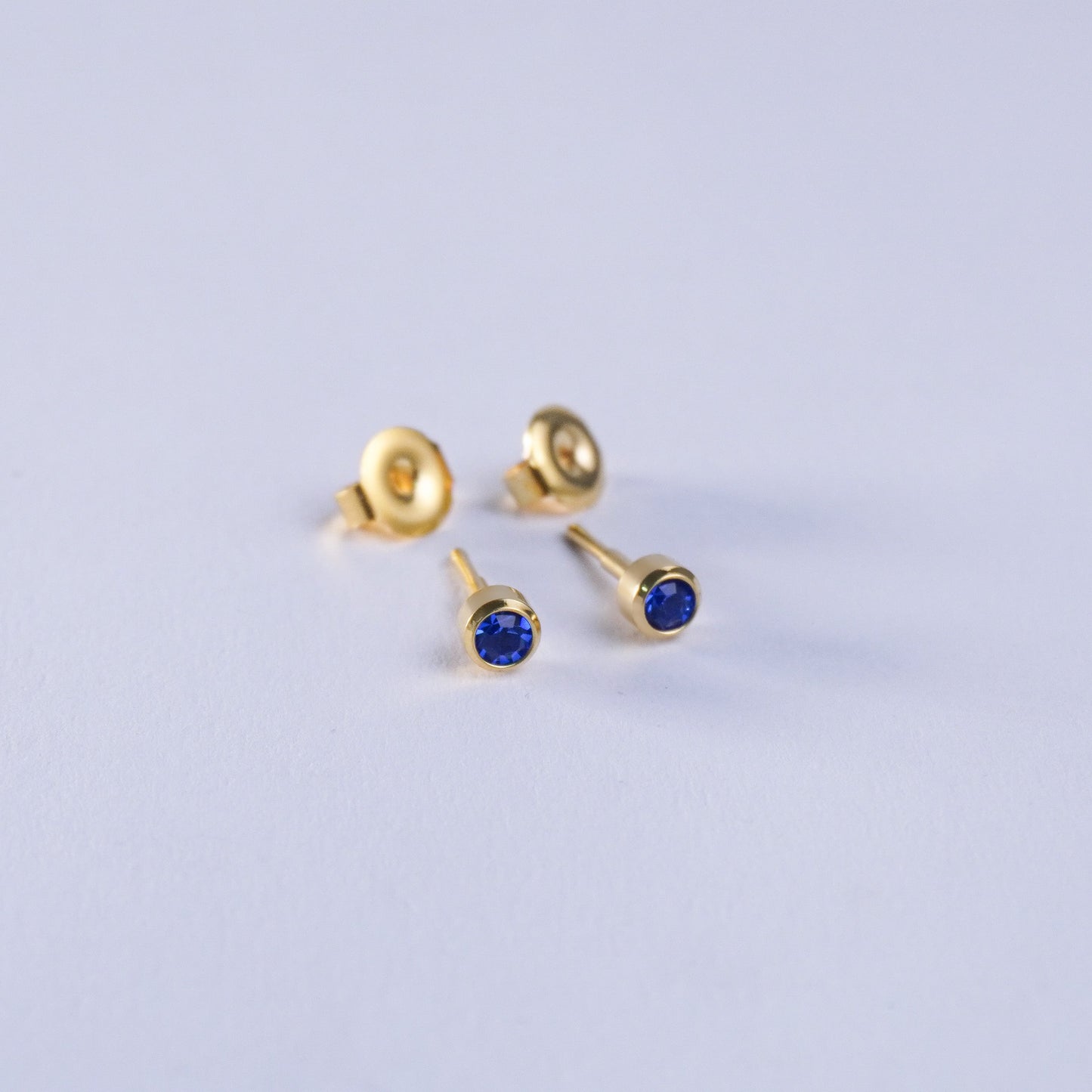 September – Sapphire Bezel Set