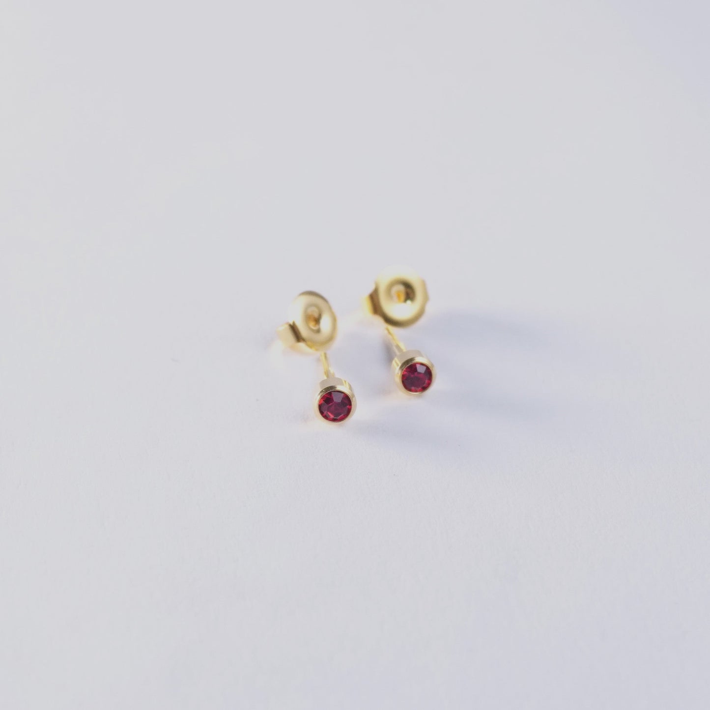July – Ruby Bezel Set
