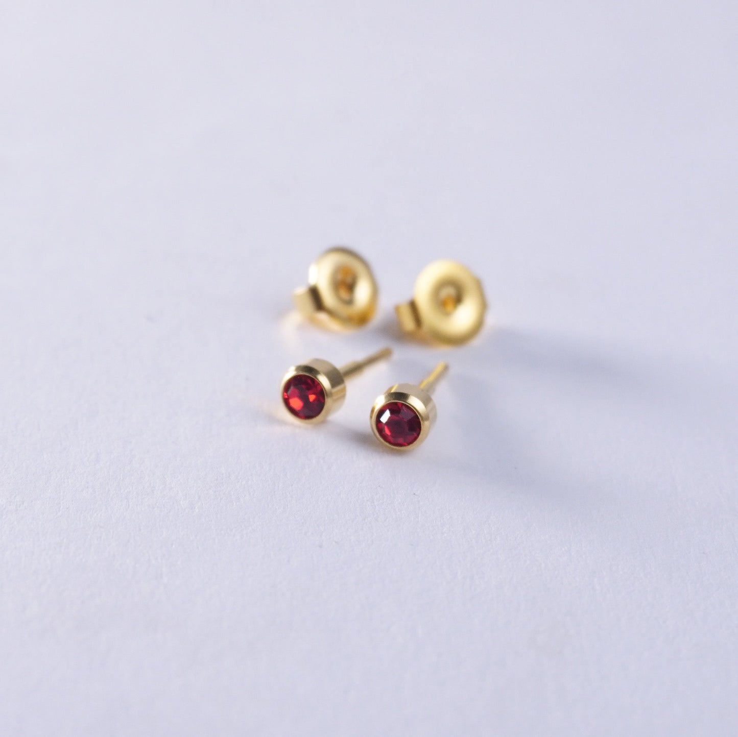 July – Ruby Bezel Set